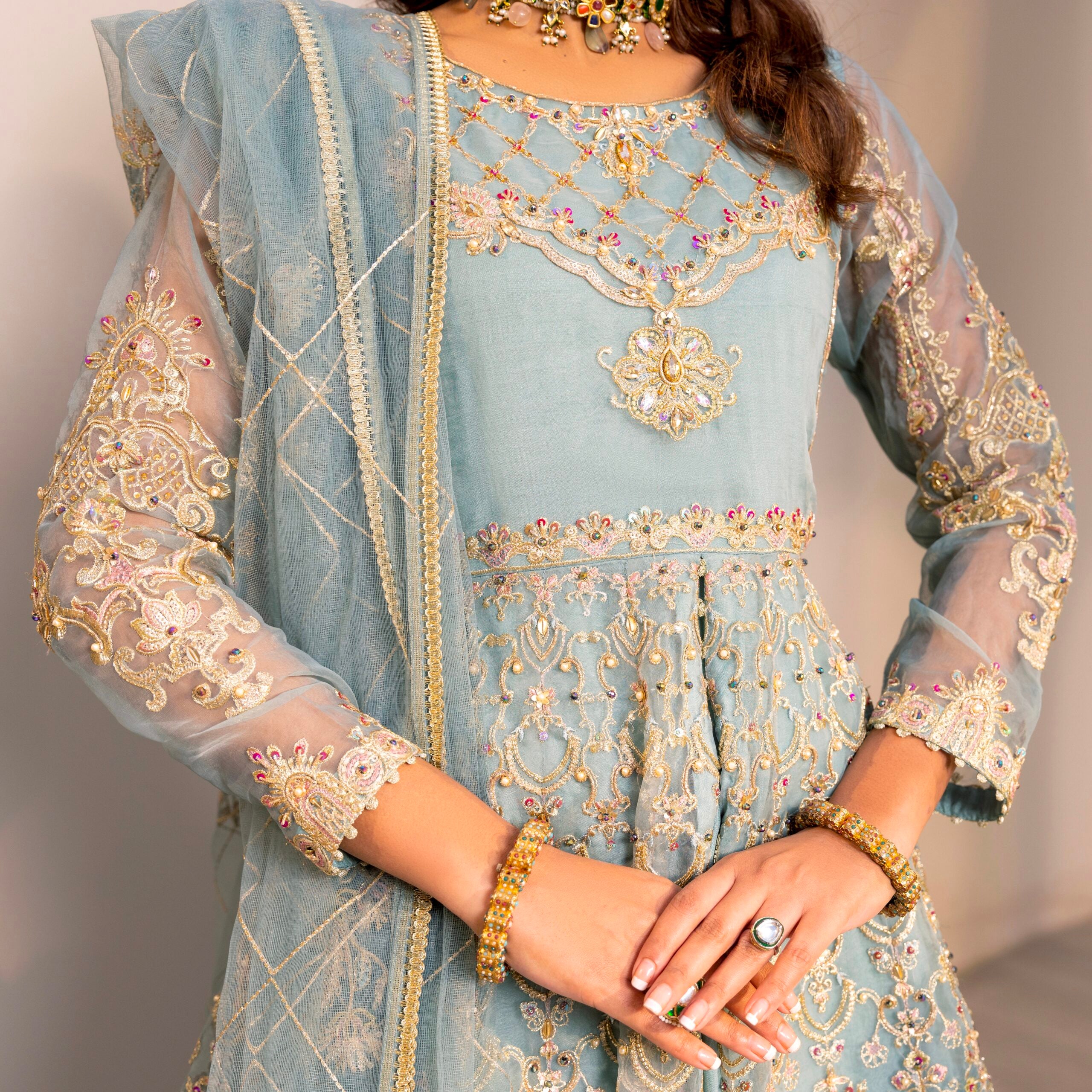 D003-f024: "Ice Blue Maxi: Hand-Embellished Elegance