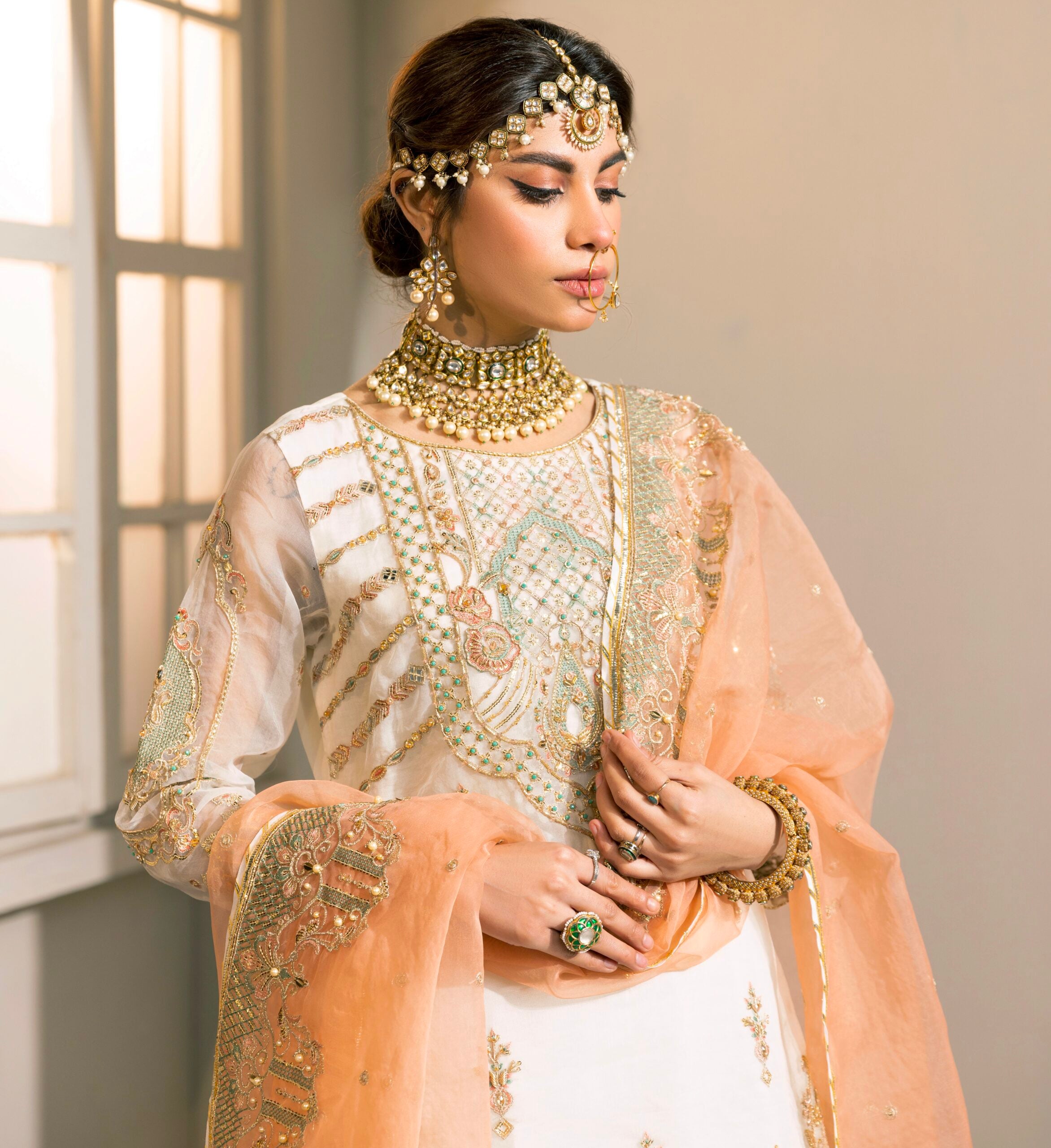 D009-f024: "White Nikkah Jora: Intricate Embellishments