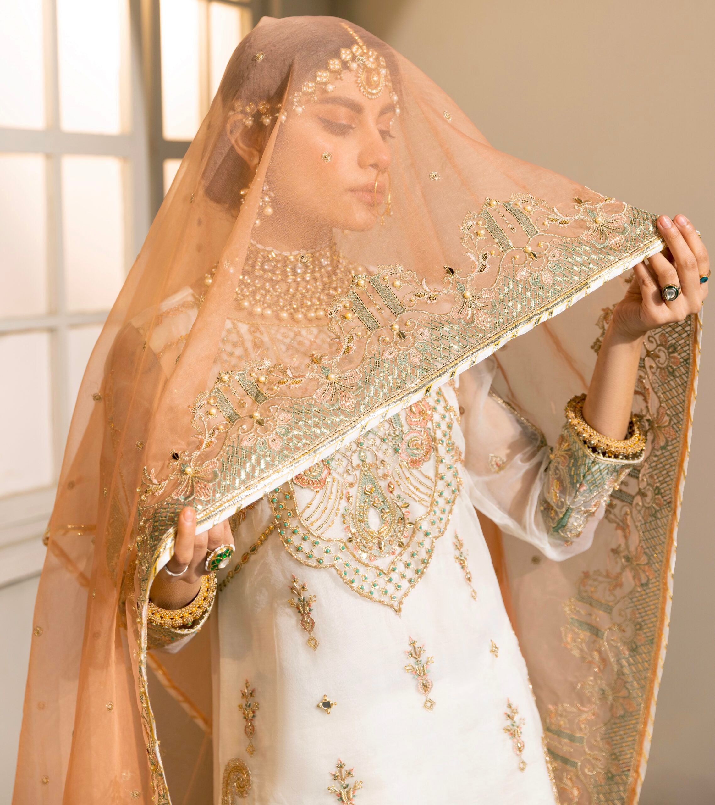 D009-f024: "White Nikkah Jora: Intricate Embellishments